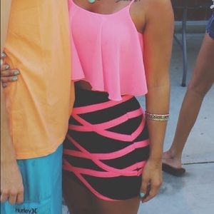 Black and neon pink mini skirt